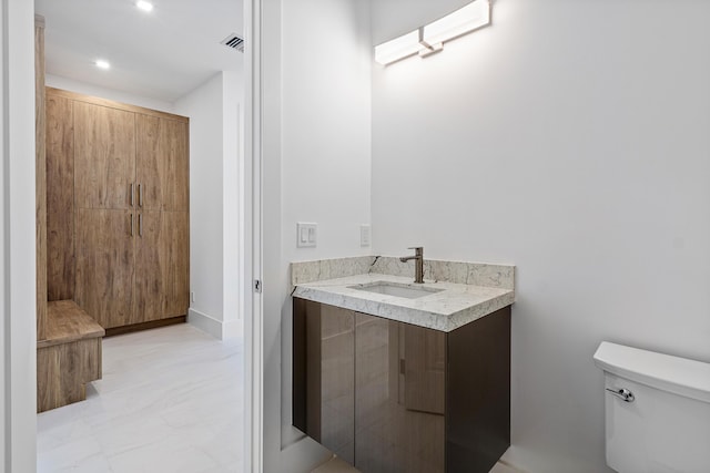 3100 Palm Dr, Delray Beach, FL 33483 - bathroom featuring recessed lighting, visible vents, toilet, and vanity