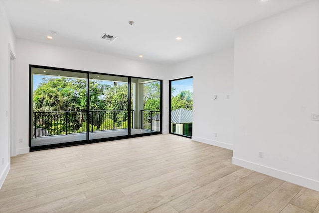 3100 Palm Dr, Delray Beach, FL 33483 - spare room with recessed lighting, light wood-style floors, visible vents, and baseboards