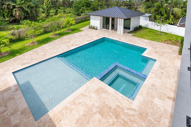 3100 Palm Dr, Delray Beach, FL 33483 - view of swimming pool with a fenced backyard, a yard, a pool with connected hot tub, and a patio