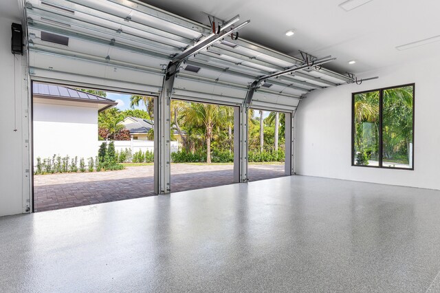 3100 Palm Dr, Delray Beach, FL 33483 - garage featuring recessed lighting