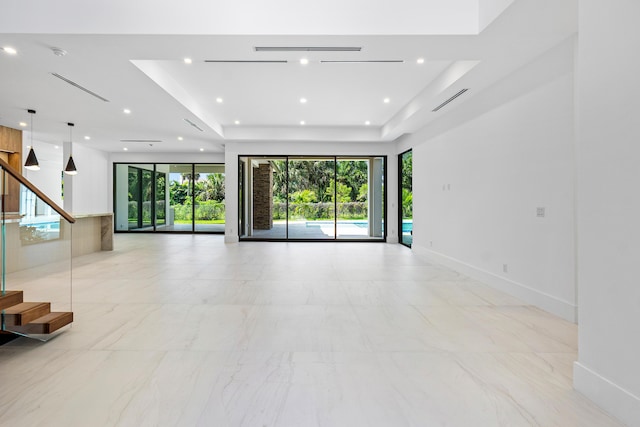 3100 Palm Dr, Delray Beach, FL 33483 - interior space with a tray ceiling, baseboards, recessed lighting, marble finish floor, and stairway