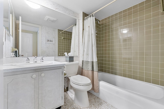 full bathroom featuring vanity, shower / bath combo, tile patterned floors, and toilet