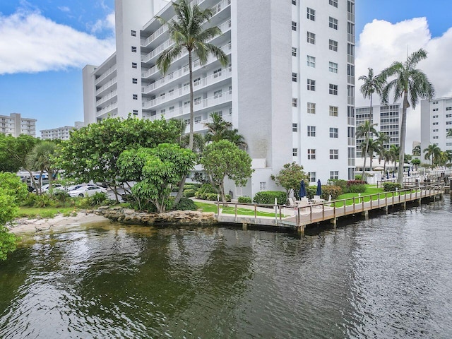 view of building exterior with a water view