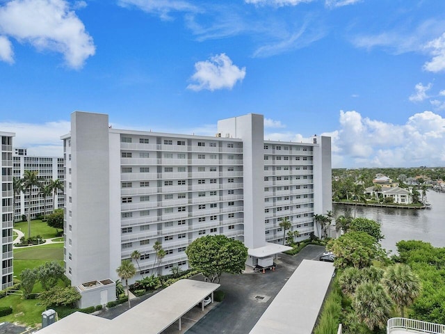 view of building exterior with a water view