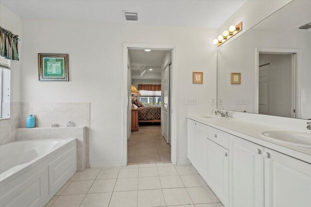 full bathroom featuring separate shower and tub, tile patterned flooring, vanity, and toilet