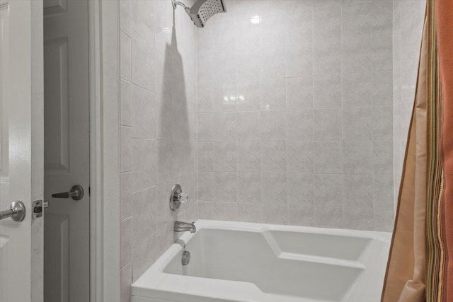 bathroom featuring shower / bath combo with shower curtain