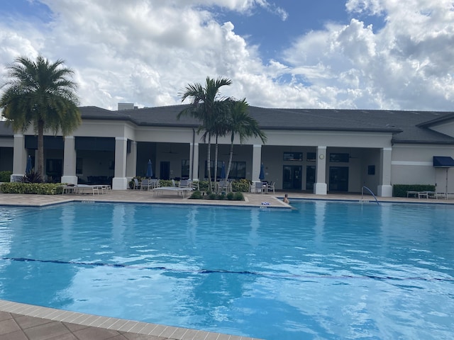 view of pool featuring a patio