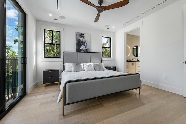 bedroom featuring connected bathroom, ceiling fan, access to outside, and light wood-type flooring