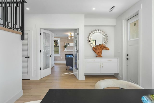 hallway featuring light wood-type flooring