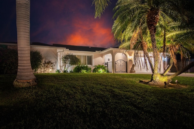 601 SE Karrigan Ter, Port Saint Lucie, FL 34983 - view of front of property with a front yard and stucco siding