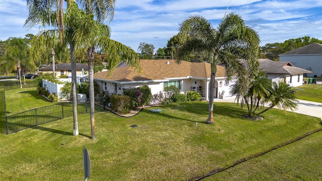 601 SE Karrigan Ter, Port Saint Lucie, FL 34983 - ranch-style home with driveway, an attached garage, and stucco siding