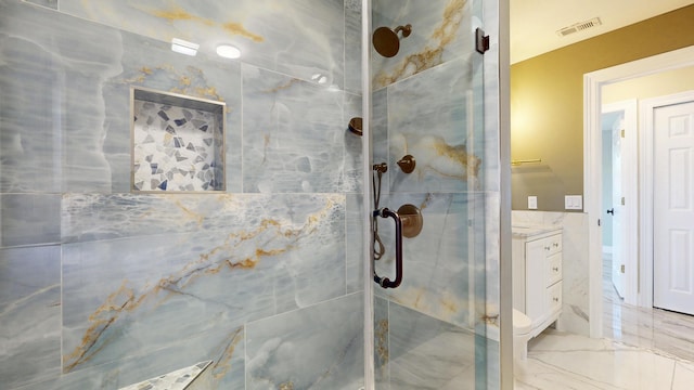 601 SE Karrigan Ter, Port Saint Lucie, FL 34983 - bathroom with a shower stall, marble finish flooring, and vanity