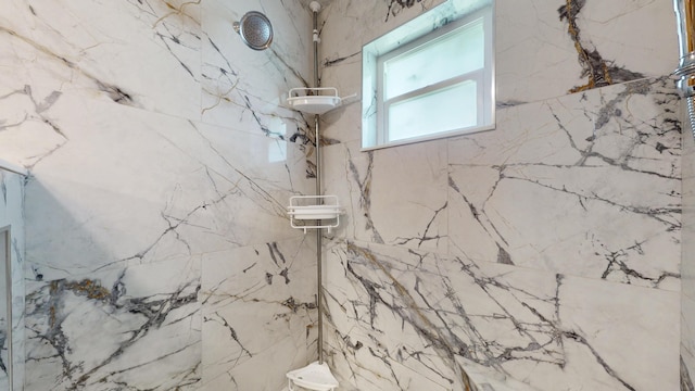 601 SE Karrigan Ter, Port Saint Lucie, FL 34983 - full bathroom featuring a marble finish shower
