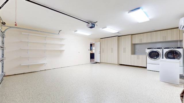 601 SE Karrigan Ter, Port Saint Lucie, FL 34983 - garage with washer and dryer, a garage door opener, and a wall unit AC