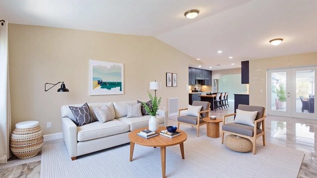 601 SE Karrigan Ter, Port Saint Lucie, FL 34983 - living room featuring french doors and lofted ceiling