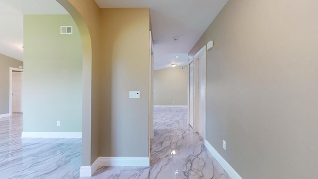 601 SE Karrigan Ter, Port Saint Lucie, FL 34983 - hall with arched walkways and light marble finish floors