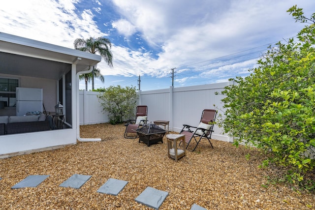 601 SE Karrigan Ter, Port Saint Lucie, FL 34983 - view of yard featuring a fire pit