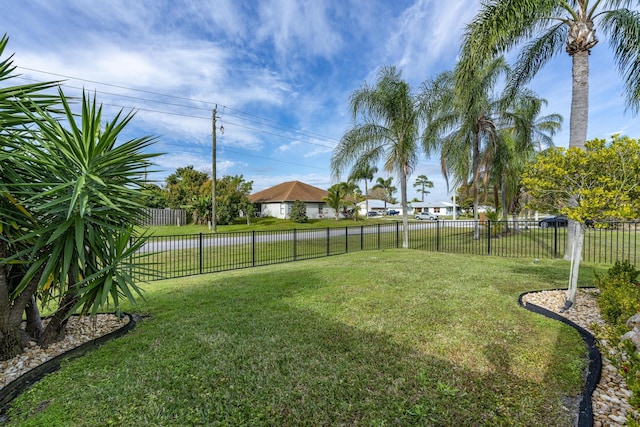 601 SE Karrigan Ter, Port Saint Lucie, FL 34983 - fenced backyard with a residential view