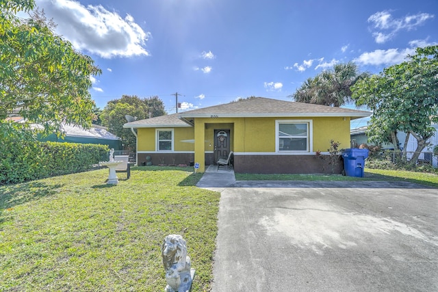 view of front of home with a front yard