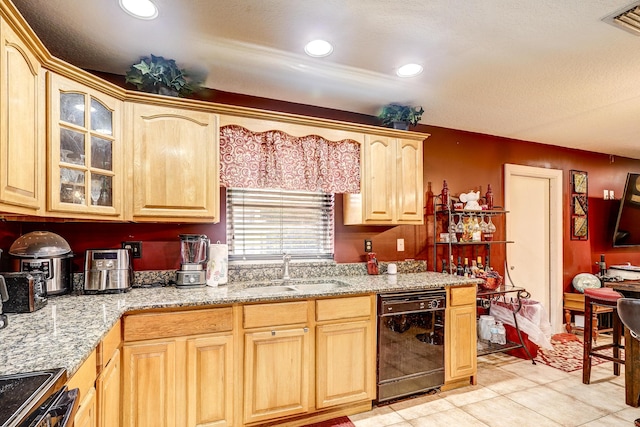 kitchen featuring range with electric stovetop, dishwasher, sink, and light stone counters