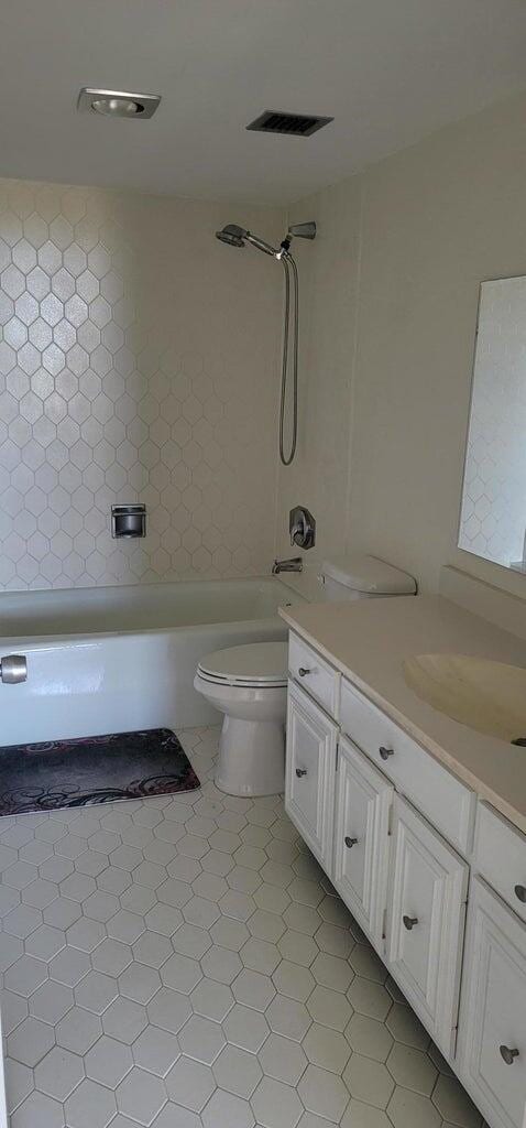 2425 Presidential Way Unit 402, West Palm Beach, FL 33401 - full bathroom with toilet, vanity, and shower / washtub combination