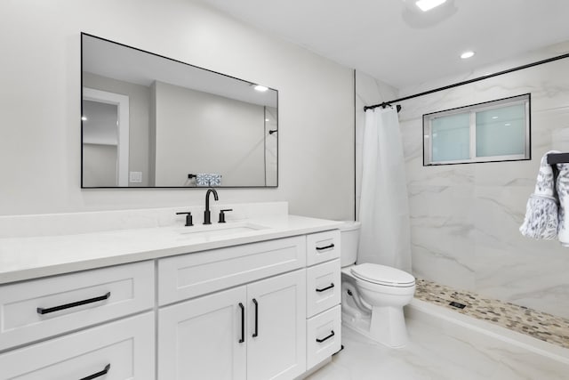 bathroom with toilet, a shower with shower curtain, and vanity