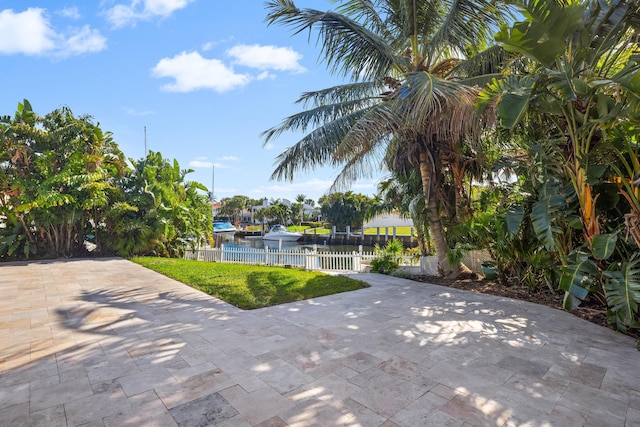 view of patio with a water view