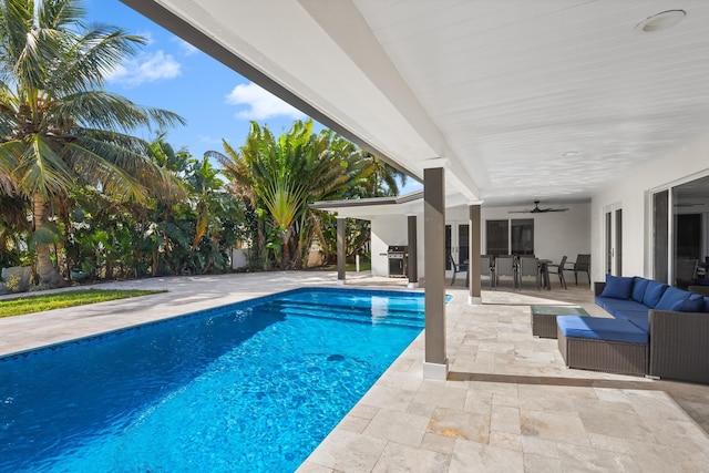 view of pool featuring ceiling fan, an outdoor hangout area, and a patio