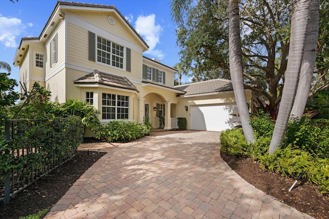 view of front of home with a garage