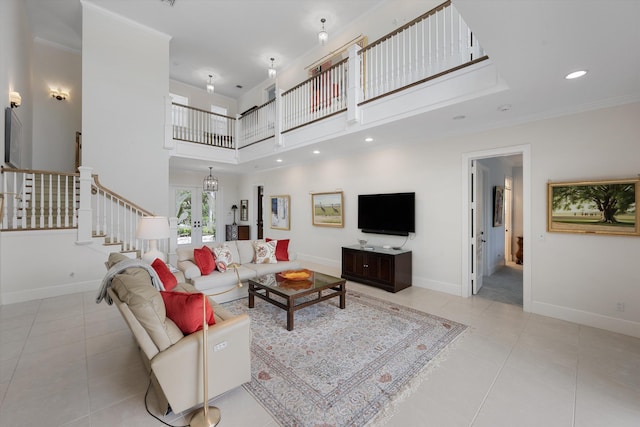 living room featuring french doors, ornamental molding, light tile patterned floors, and a high ceiling