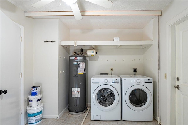 laundry room featuring water heater, a textured ceiling, ceiling fan, and separate washer and dryer