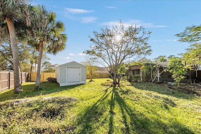 view of yard featuring a storage unit