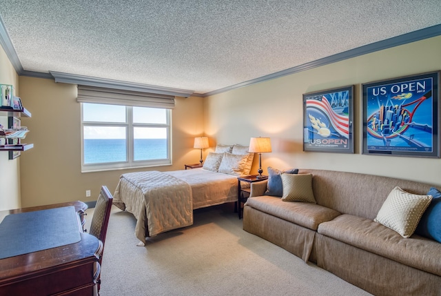 carpeted bedroom featuring a textured ceiling, ornamental molding, and a water view