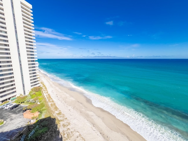 view of water feature with a beach view