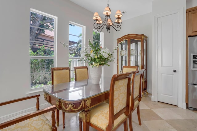 dining room with an inviting chandelier