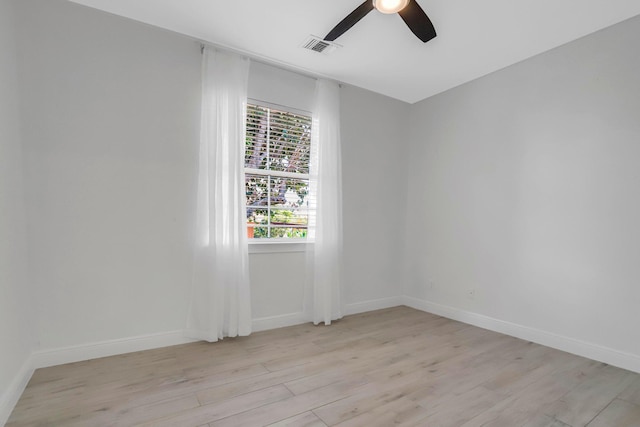 unfurnished room featuring ceiling fan and light hardwood / wood-style floors