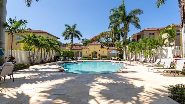 view of swimming pool with a patio area