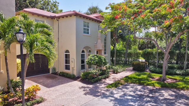 view of property exterior with a garage