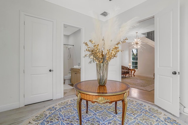 interior space featuring a chandelier