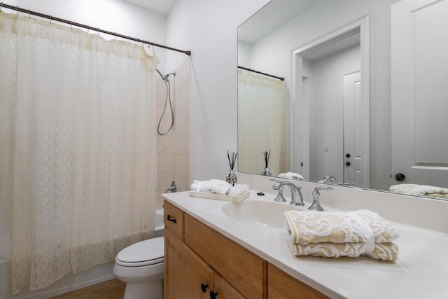 full bathroom with shower / bathtub combination with curtain, vanity, and toilet