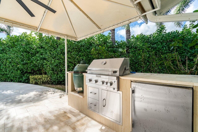 view of patio / terrace featuring a grill