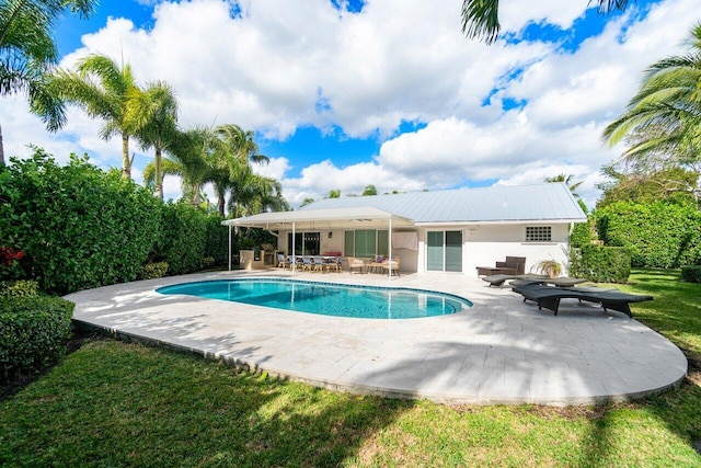 view of pool featuring outdoor lounge area and a patio area