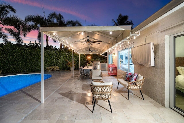 patio terrace at dusk with area for grilling