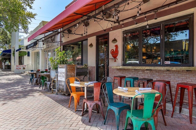 view of patio featuring an outdoor bar