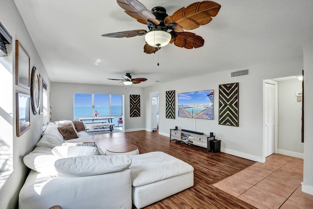 living room with light hardwood / wood-style flooring