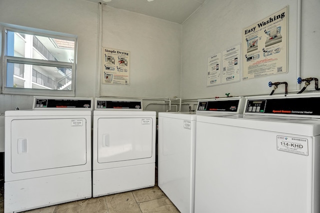 clothes washing area featuring washing machine and clothes dryer