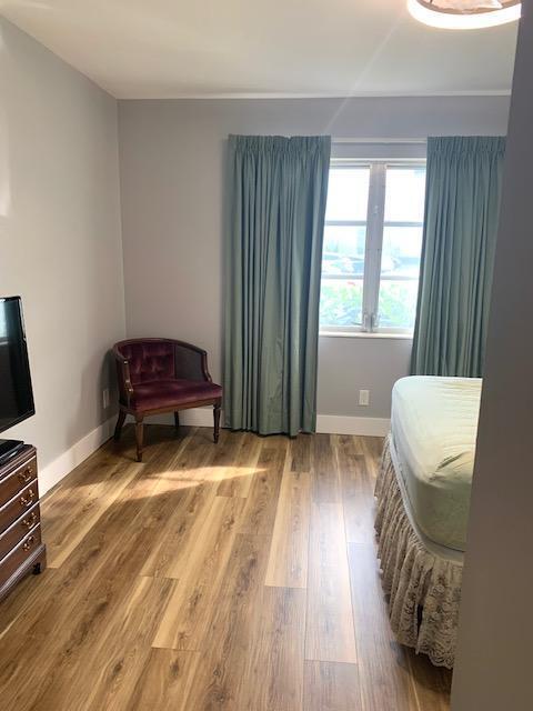 bedroom featuring hardwood / wood-style flooring