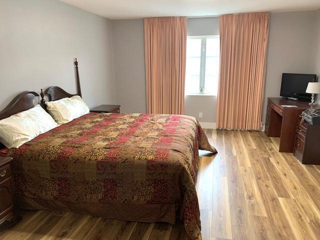 bedroom featuring light wood-type flooring