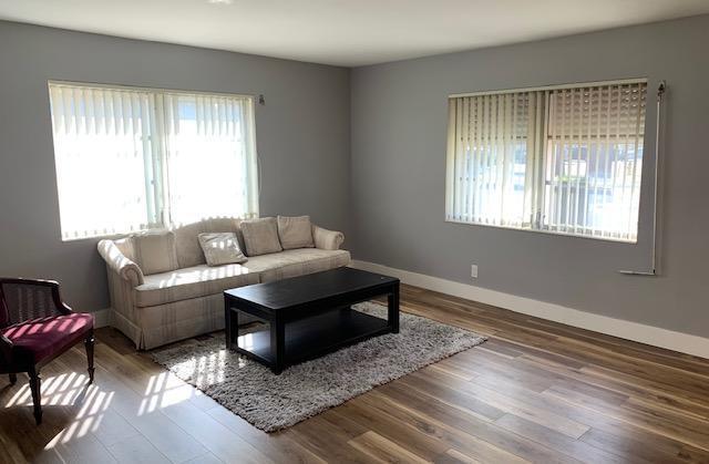 living room with hardwood / wood-style flooring