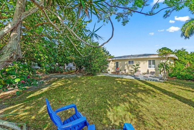 view of yard with a patio area